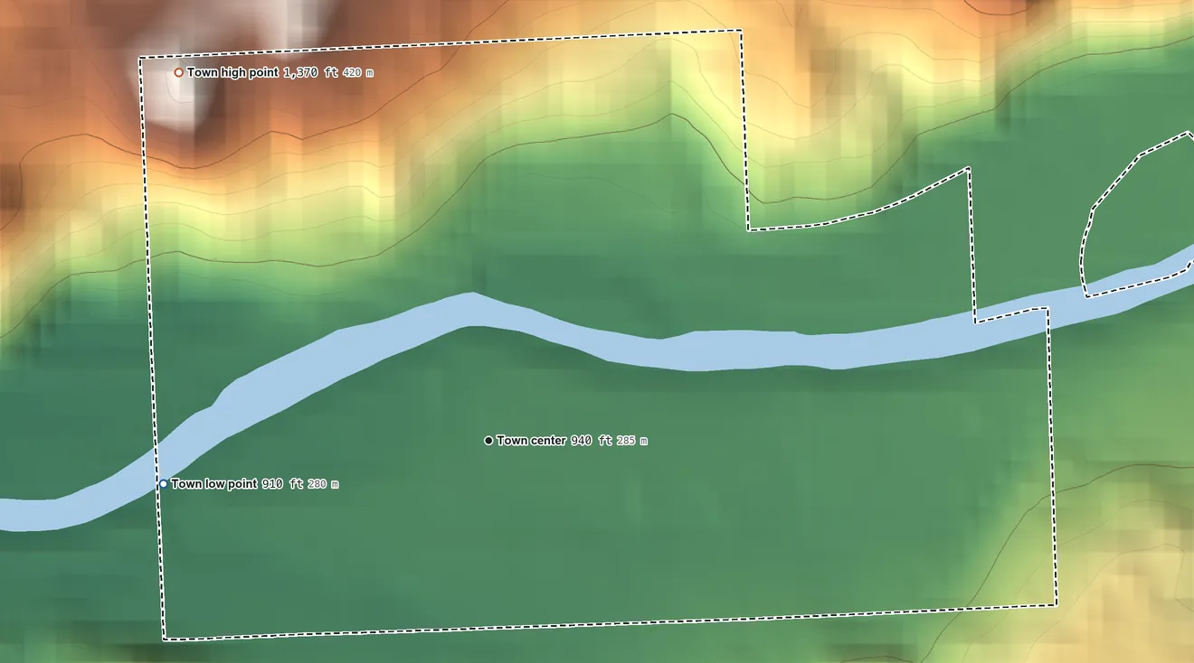 Topographic elevation map of Skykomish, Washington, shaded from 910 ft on the west side to 1,370 ft on the northwest edge, below higher ground just outside