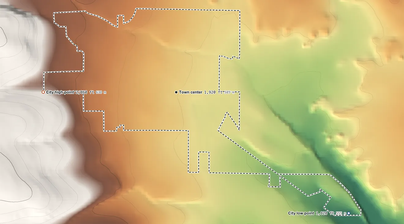 Topographic elevation map of Tieton, Washington, shaded from 1,820 ft on the southeast side to 2,060 ft on the west edge, below higher ground just outside