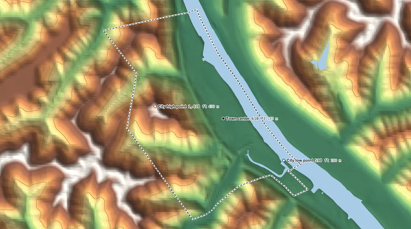 Topographic elevation map of Marmet, West Virginia, shaded from 590 ft on the southeast side to 1,410 ft on the west side