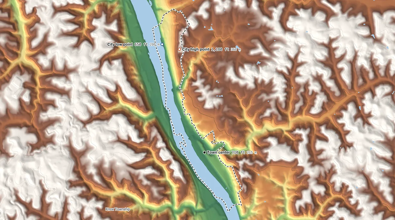 Topographic elevation map of New Cumberland, West Virginia, shaded from 650 ft on the north side to 1,180 ft on the north side