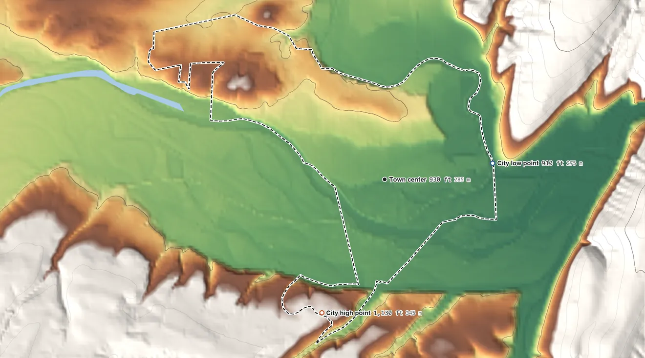 Topographic elevation map of Petersburg, West Virginia, shaded from 910 ft on the east side to 1,130 ft on the southwest edge, below higher ground just outside