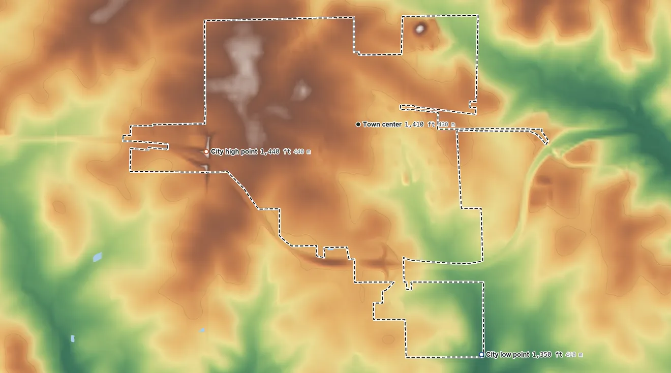 Topographic elevation map of Abbotsford, Wisconsin, shaded from 1,350 ft on the southeast side to 1,440 ft on the west side