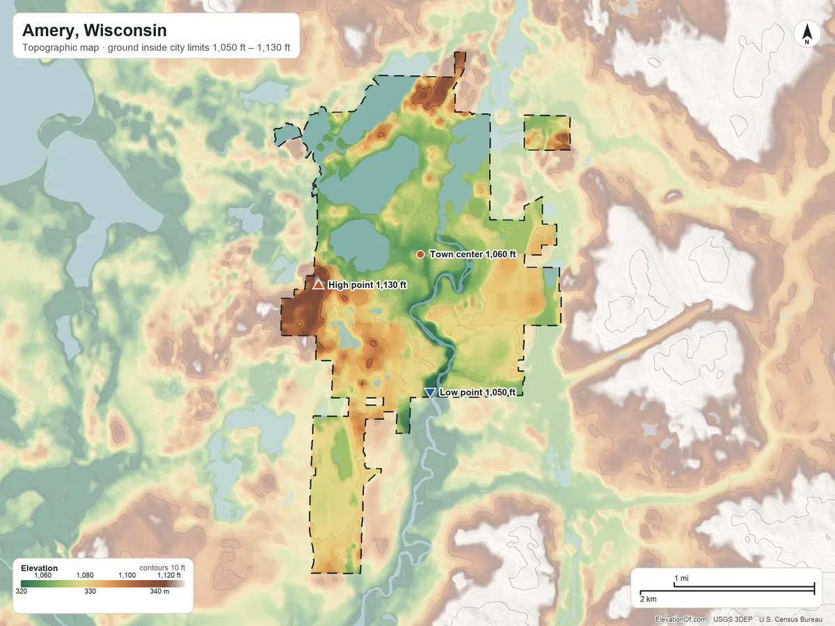 Topographic elevation map of Amery, Wisconsin, shaded from 1,050 ft on the south side to 1,130 ft on the west side