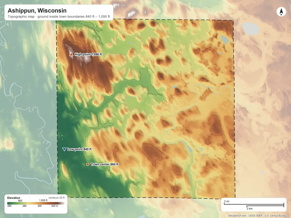 Topographic elevation map of Ashippun, Wisconsin, shaded from 840 ft on the northwest side to 1,090 ft on the north side