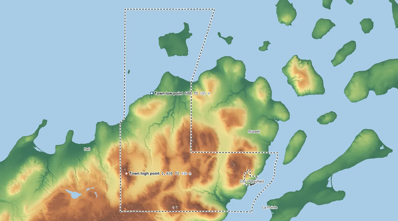 Topographic elevation map of Bayfield, Wisconsin, shaded from 600 ft on the northwest side to 1,420 ft on the west side