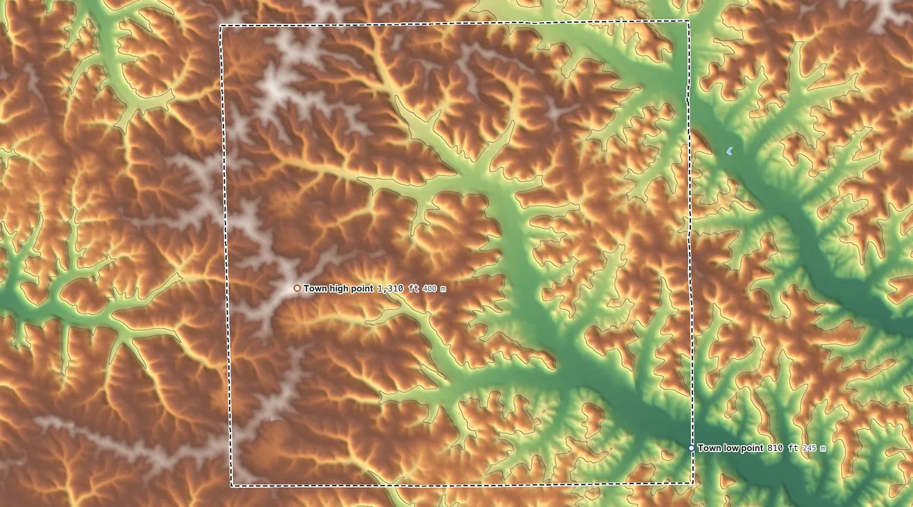 Topographic elevation map of Bloom, Wisconsin, shaded from 810 ft on the southeast side to 1,310 ft on the southwest side