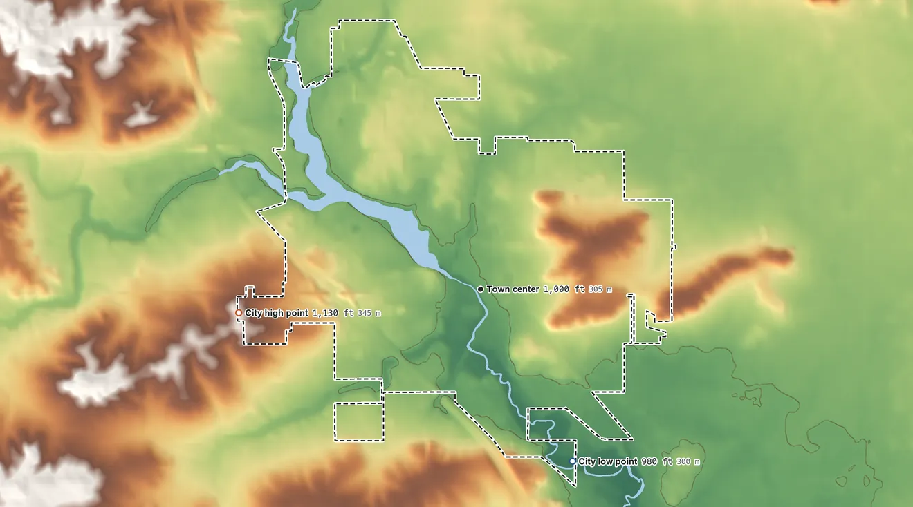 Topographic elevation map of Bloomer, Wisconsin, shaded from 980 ft on the southeast side to 1,130 ft on the west side
