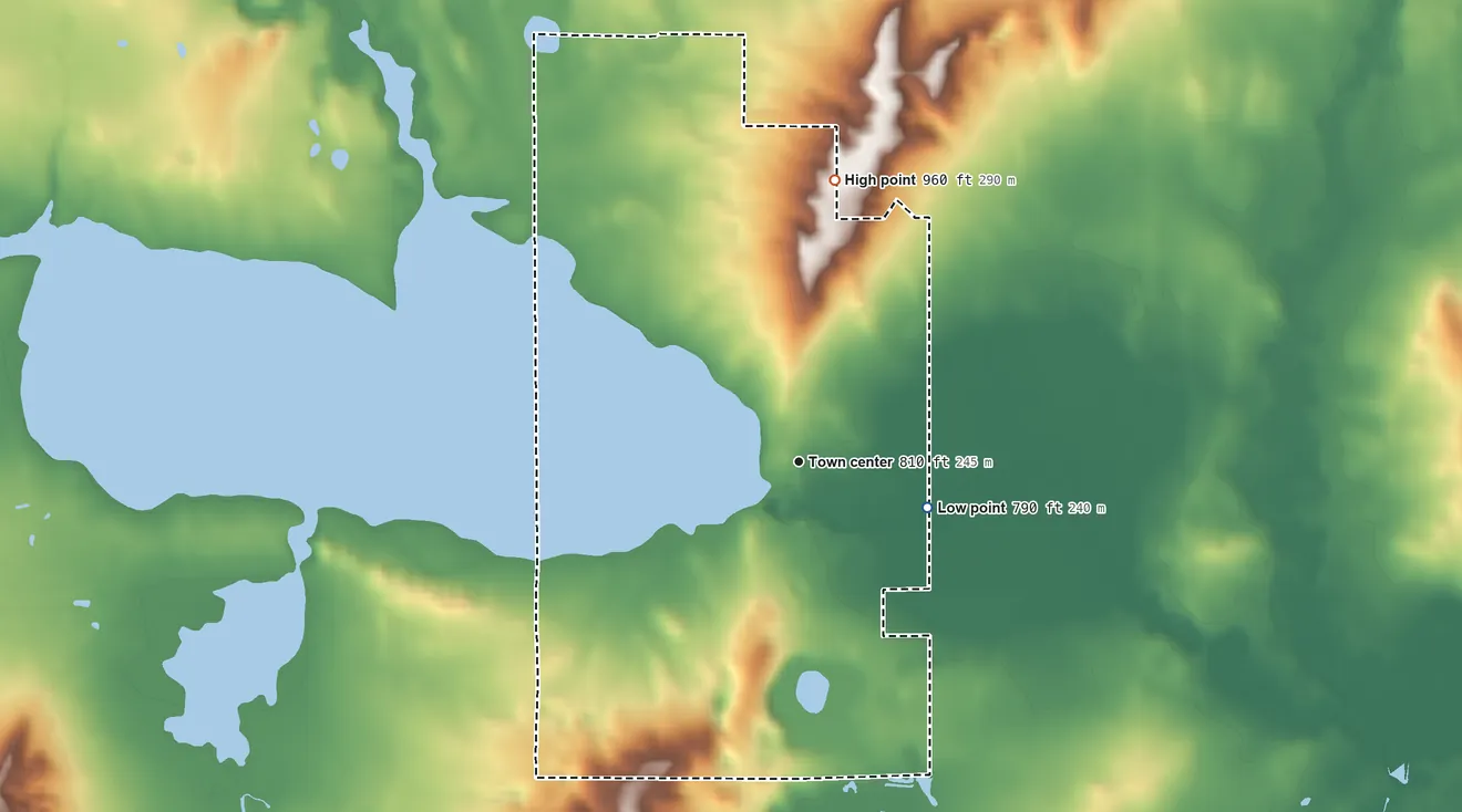 Topographic elevation map of Briggsville, Wisconsin, shaded from 790 ft on the east side to 960 ft on the north side