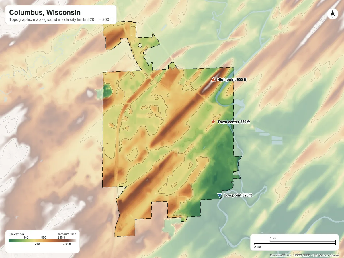 Topographic elevation map of Columbus, Wisconsin, shaded from 820 ft on the south side to 900 ft on the north side