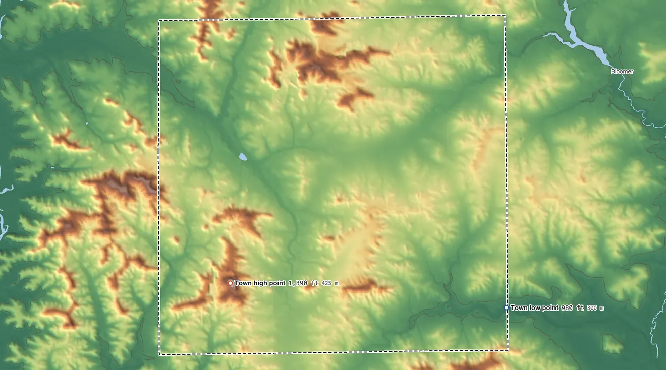 Topographic elevation map of Cooks Valley, Wisconsin, shaded from 980 ft on the southeast side to 1,390 ft on the southwest side