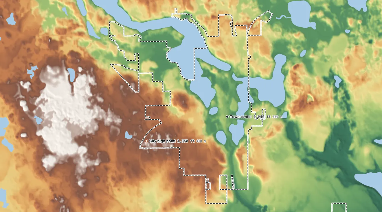 Topographic elevation map of Cumberland, Wisconsin, shaded from 1,220 ft on the southeast side to 1,350 ft on the west side