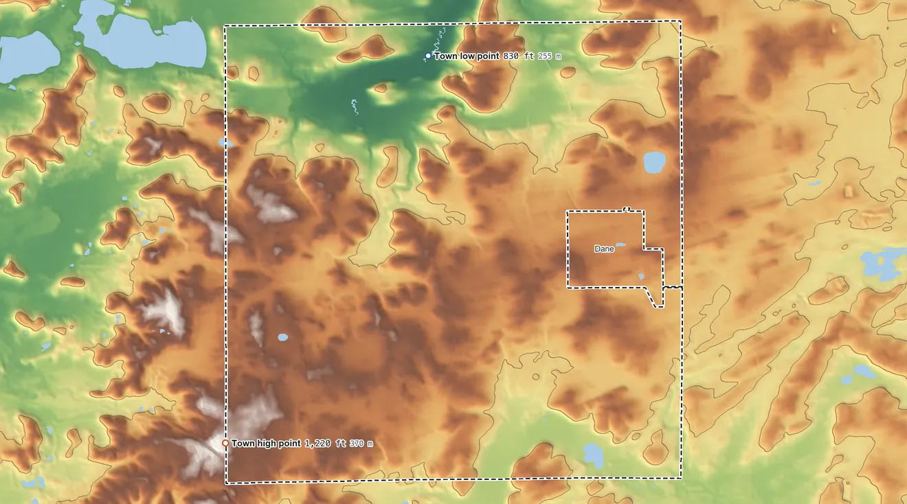 Topographic elevation map of Town of Dane, Wisconsin, shaded from 830 ft on the north side to 1,220 ft on the southwest side