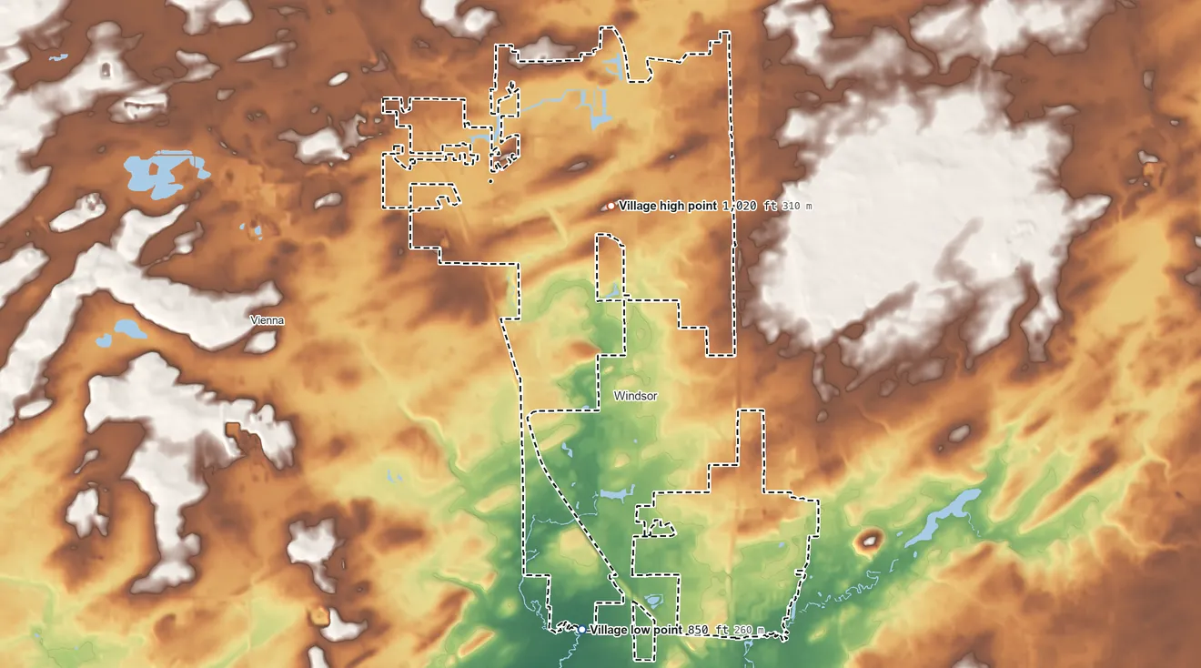 Topographic elevation map of DeForest, Wisconsin, shaded from 850 ft on the south side to 1,020 ft near the middle