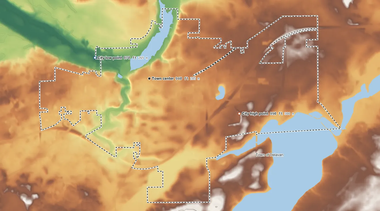 Topographic elevation map of Delavan, Wisconsin, shaded from 870 ft on the west side to 990 ft on the east side