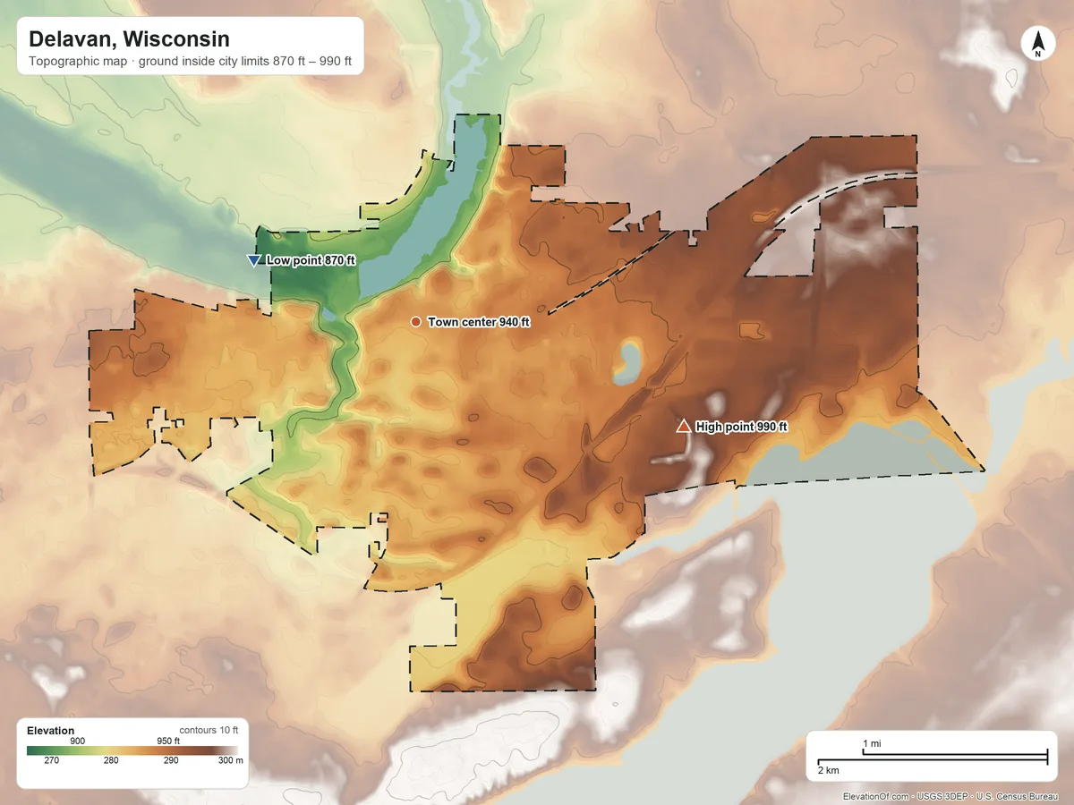 Topographic elevation map of Delavan, Wisconsin, shaded from 870 ft on the west side to 990 ft on the east side