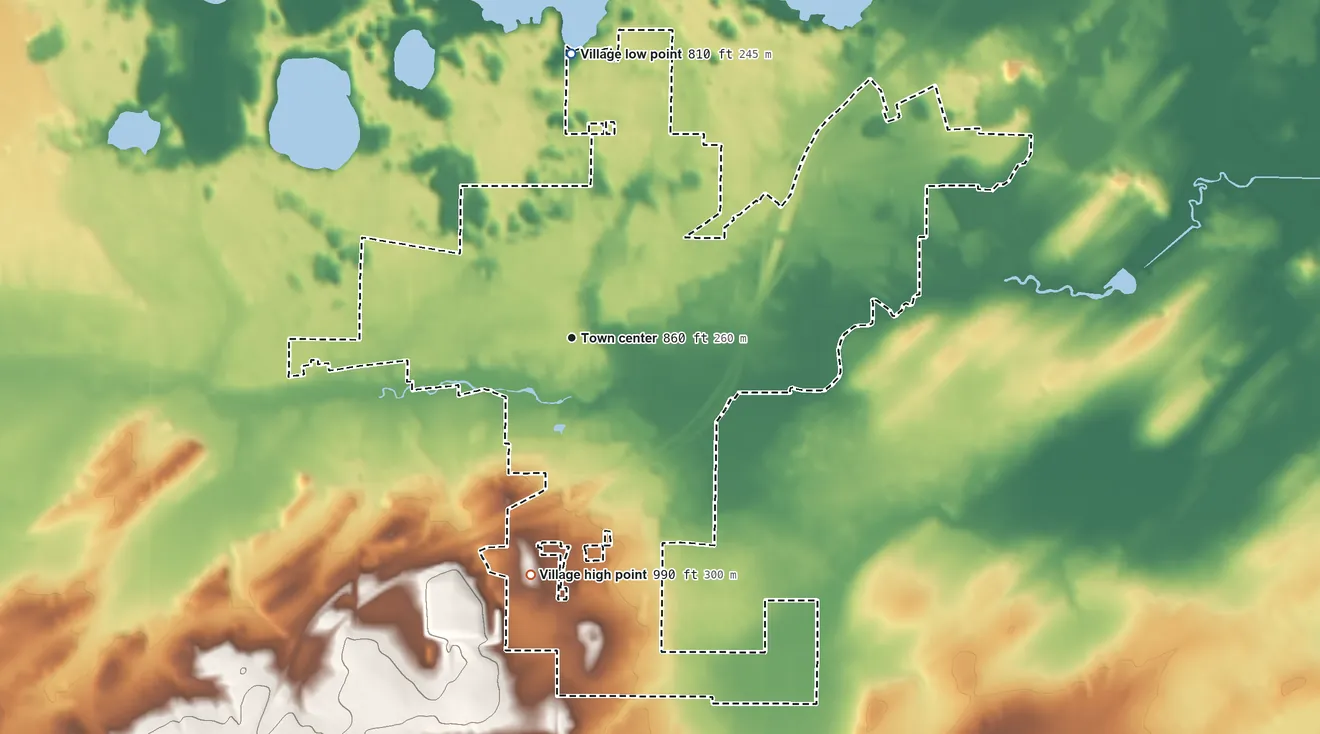 Topographic elevation map of East Troy, Wisconsin, shaded from 810 ft on the north side to 990 ft on the south side