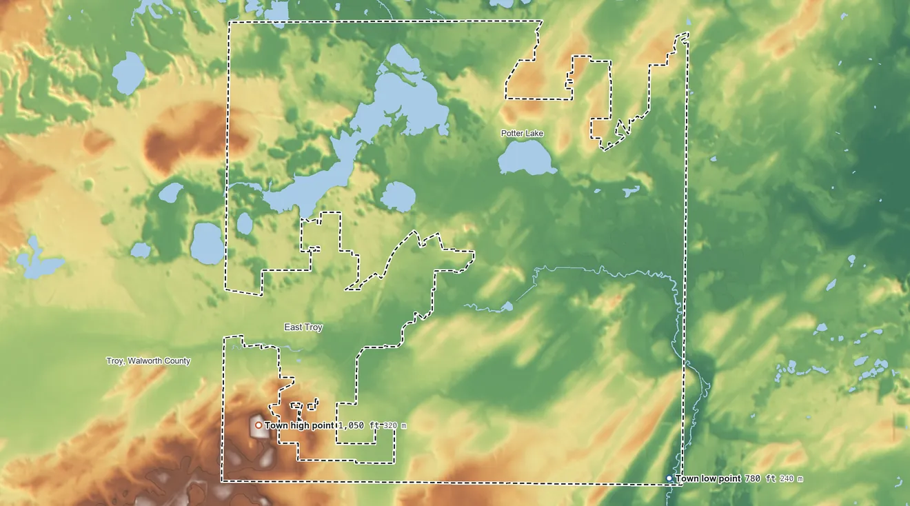 Topographic elevation map of Town of East Troy, Wisconsin, shaded from 780 ft on the southeast side to 1,050 ft on the southwest side