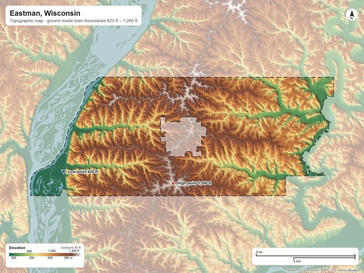 Topographic elevation map of Eastman, Wisconsin, shaded from 620 ft on the southwest side to 1,260 ft on the south side
