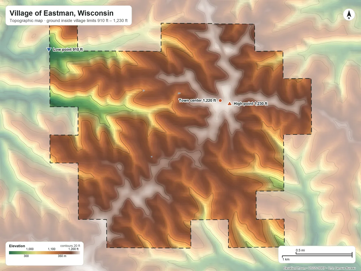 Topographic elevation map of Village of Eastman, Wisconsin, shaded from 910 ft on the west side to 1,230 ft near the middle