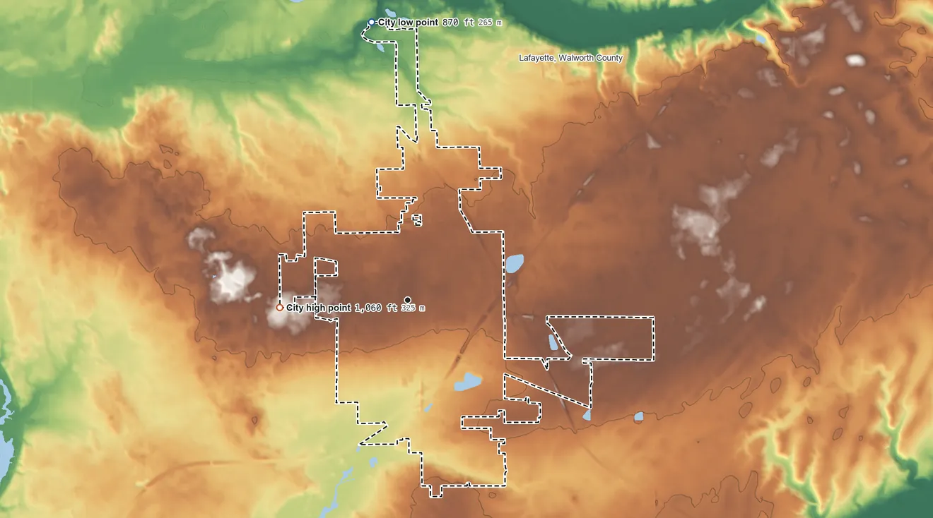 Topographic elevation map of Elkhorn, Wisconsin, shaded from 870 ft on the north side to 1,060 ft on the west side