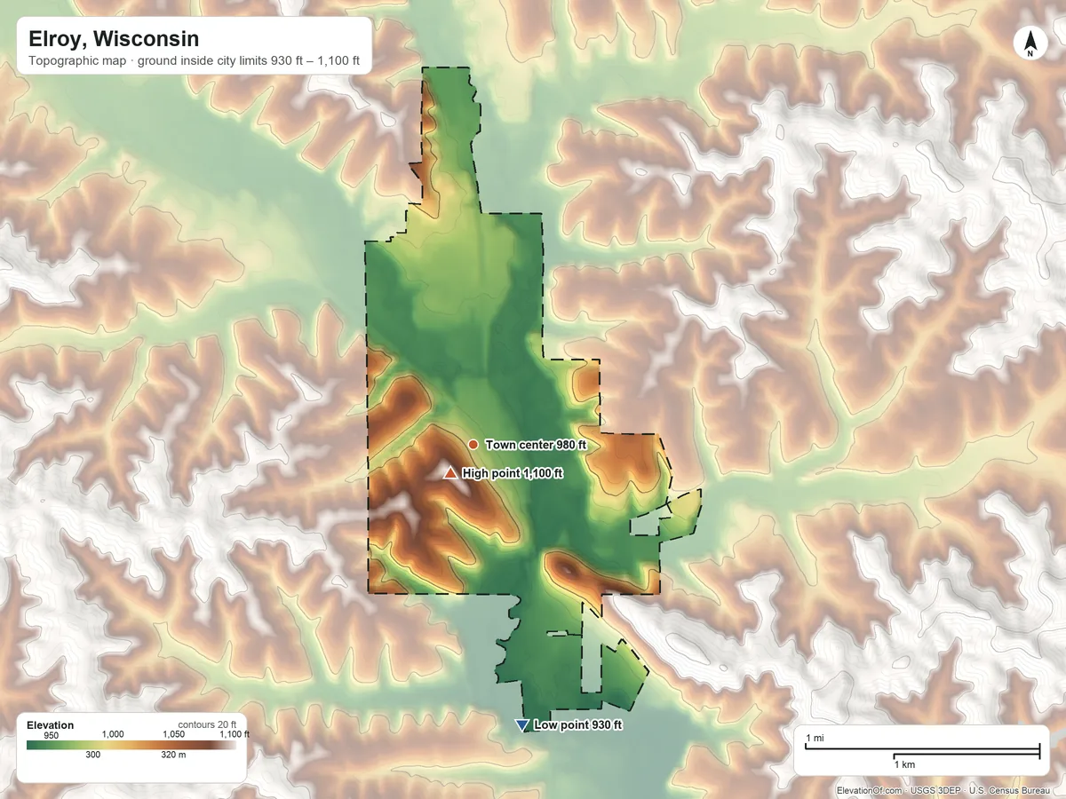 Topographic elevation map of Elroy, Wisconsin, shaded from 930 ft on the south side to 1,100 ft near the middle