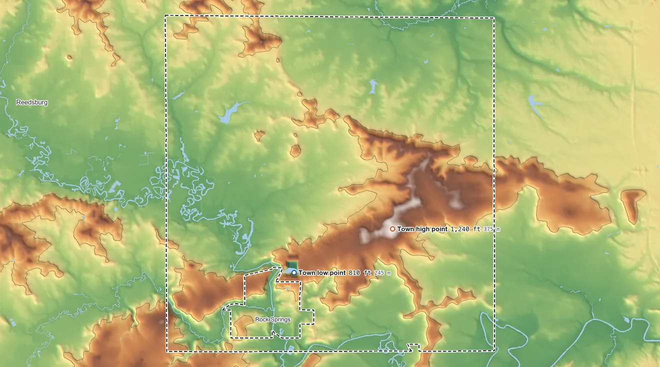 Topographic elevation map of Excelsior, Wisconsin, shaded from 810 ft on the south side to 1,240 ft on the southeast side