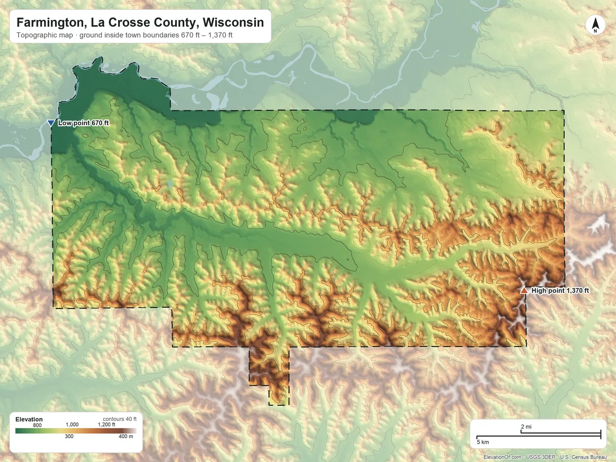 Topographic elevation map of Farmington, La Crosse County, Wisconsin, shaded from 670 ft on the west side to 1,370 ft on Wanlass Hill