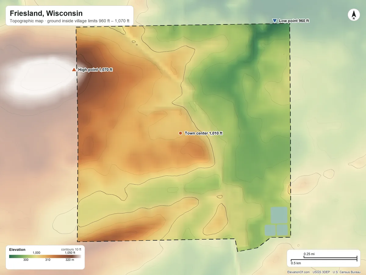 Topographic elevation map of Friesland, Wisconsin, shaded from 960 ft on the northeast side to 1,070 ft on the northwest side