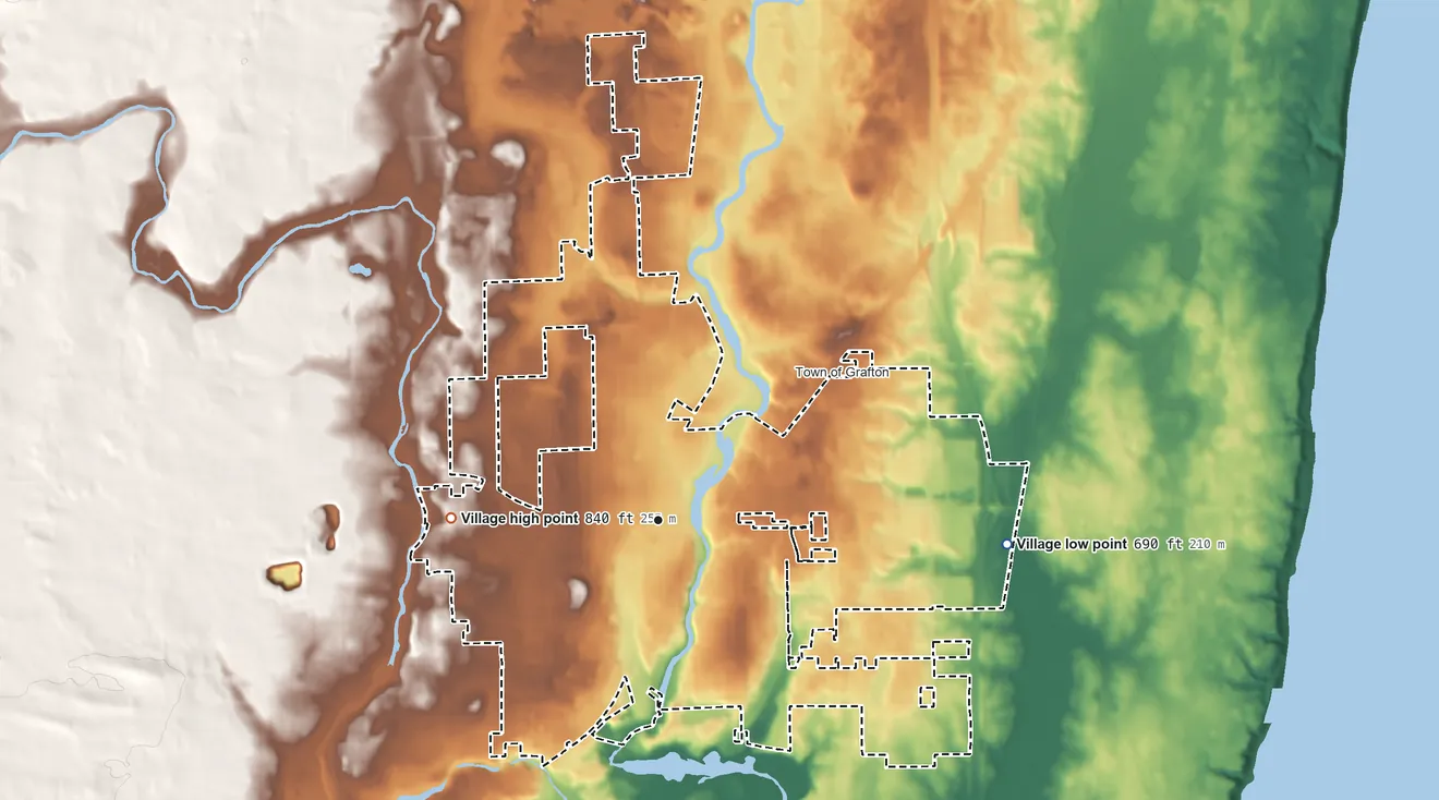 Topographic elevation map of Grafton, Wisconsin, shaded from 690 ft on the east side to 840 ft on the west side