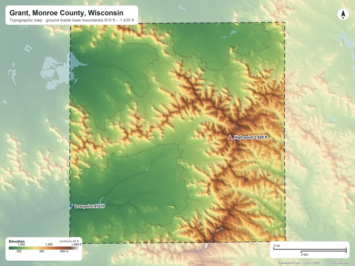 Topographic elevation map of Grant, Monroe County, Wisconsin, shaded from 910 ft on the southwest side to 1,420 ft near the middle