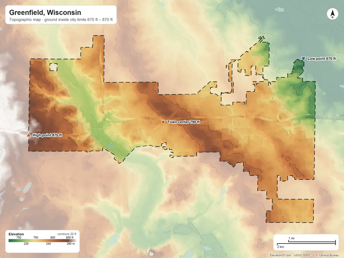Topographic elevation map of Greenfield, Wisconsin, shaded from 670 ft on the northeast side to 870 ft on the west side