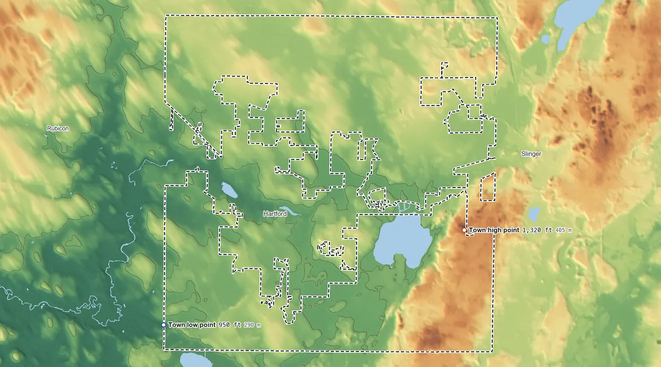 Topographic elevation map of Town of Hartford, Wisconsin, shaded from 950 ft on the southwest side to 1,320 ft on the southeast side
