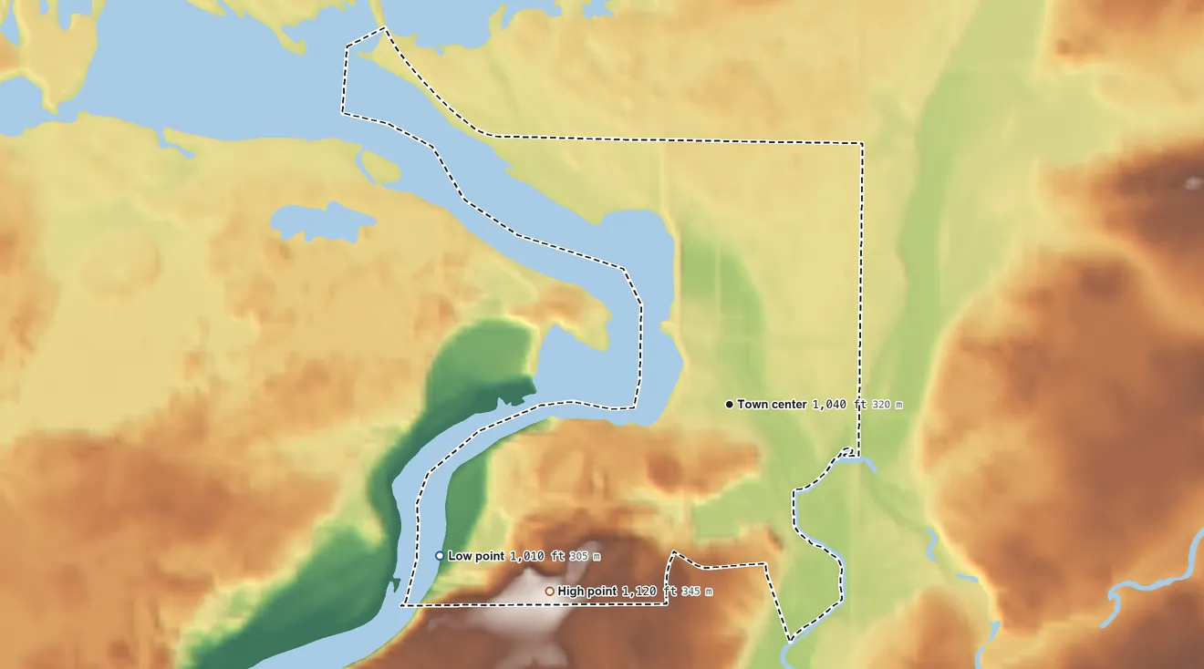 Topographic elevation map of Holcombe, Wisconsin, shaded from 1,010 ft on the southwest side to 1,120 ft on the southwest side