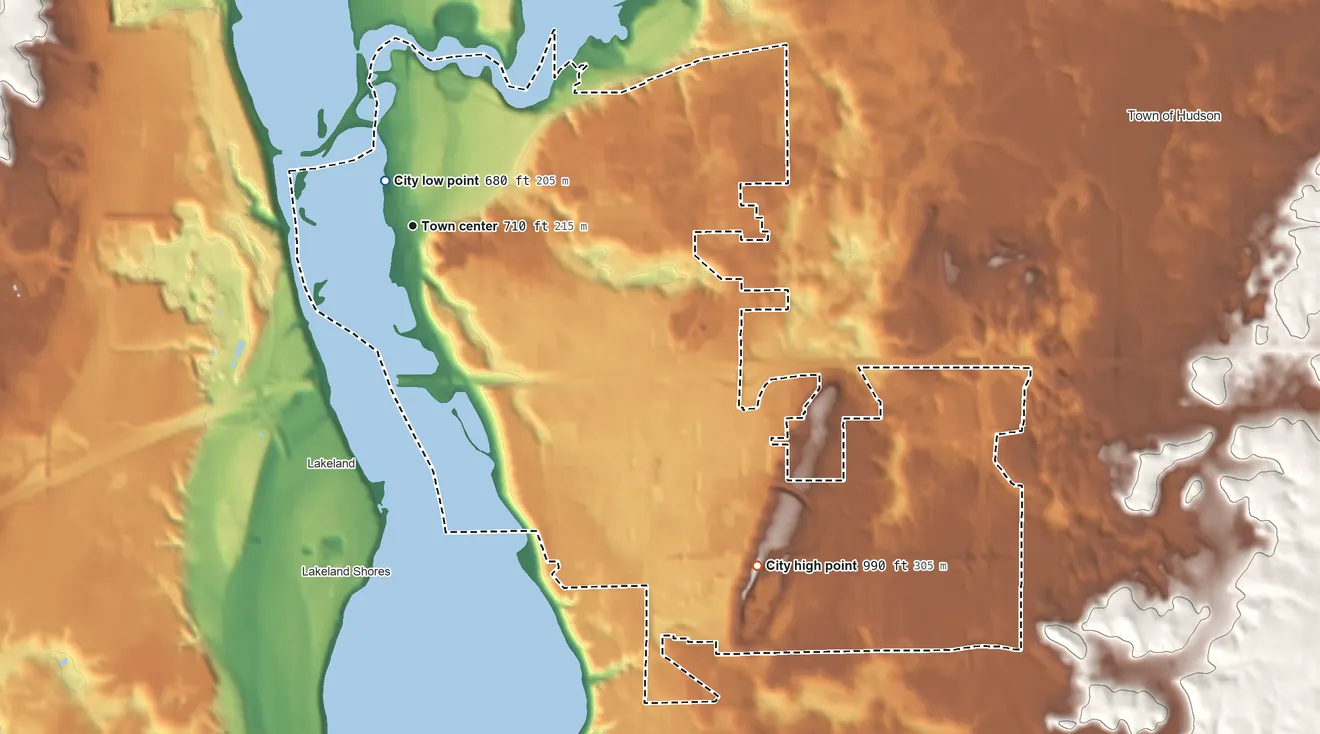 Topographic elevation map of Hudson, Wisconsin, shaded from 680 ft near the middle to 990 ft on the southeast side