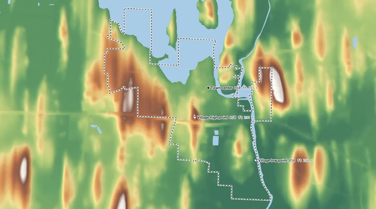 Topographic elevation map of Village of Hustisford, Wisconsin, shaded from 850 ft on the southeast side to 950 ft on the southwest side