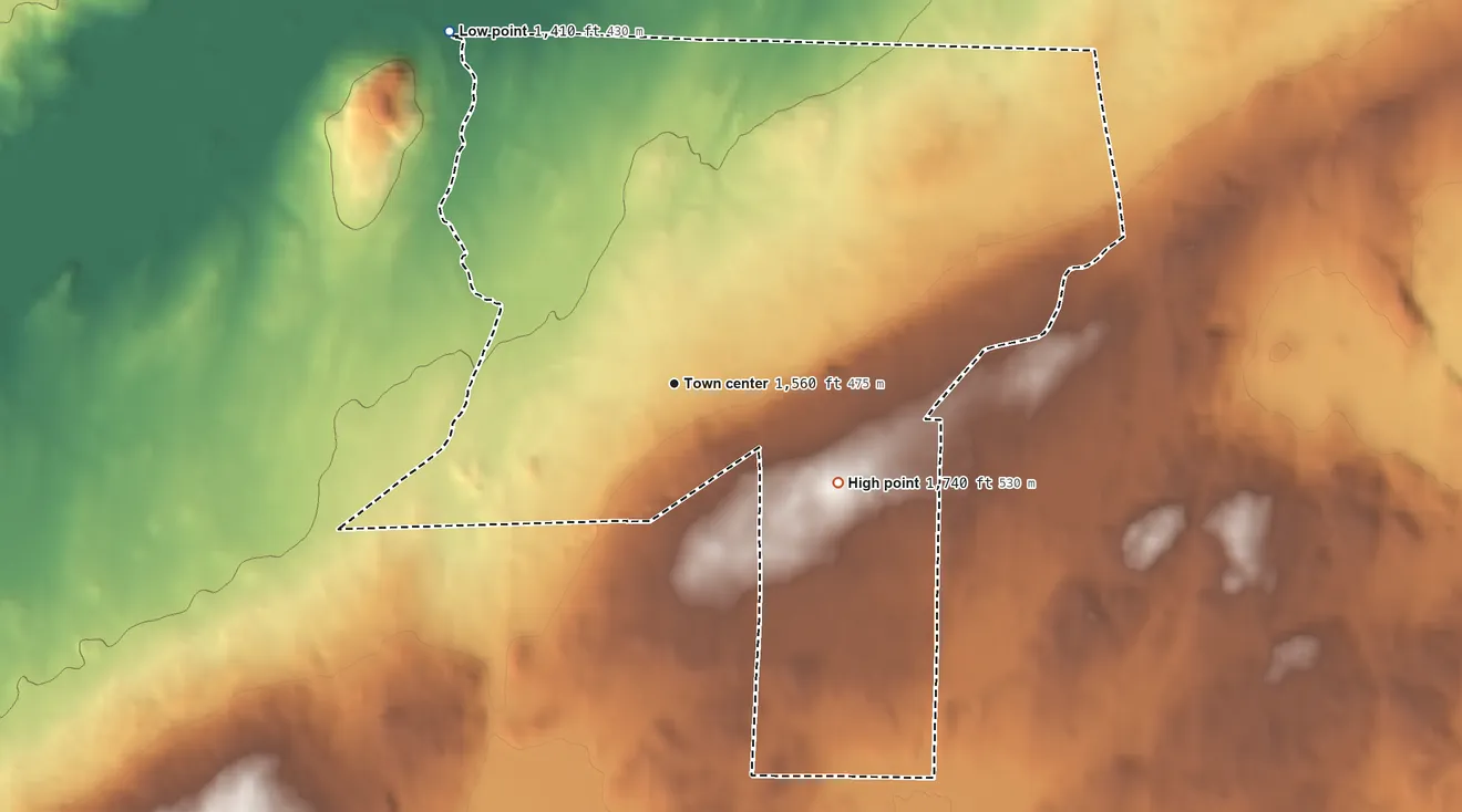 Topographic elevation map of Iron Belt, Wisconsin, shaded from 1,410 ft on the northwest side to 1,740 ft on the southeast side