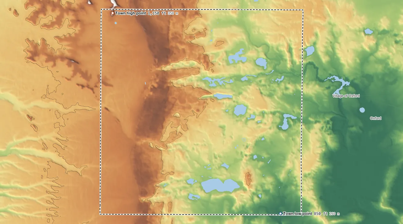 Topographic elevation map of Town of Jackson, Wisconsin, shaded from 850 ft on the southeast side to 1,150 ft on the northwest side