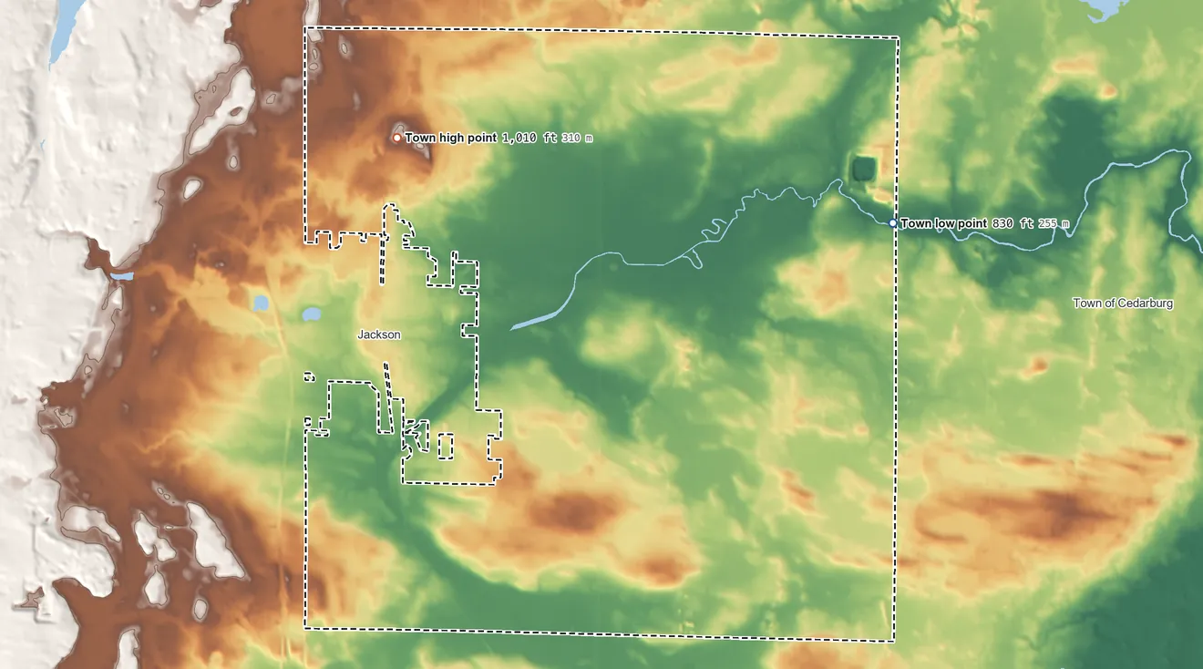 Topographic elevation map of Town of Jackson, Wisconsin, shaded from 830 ft on the northeast side to 1,010 ft on the northwest side