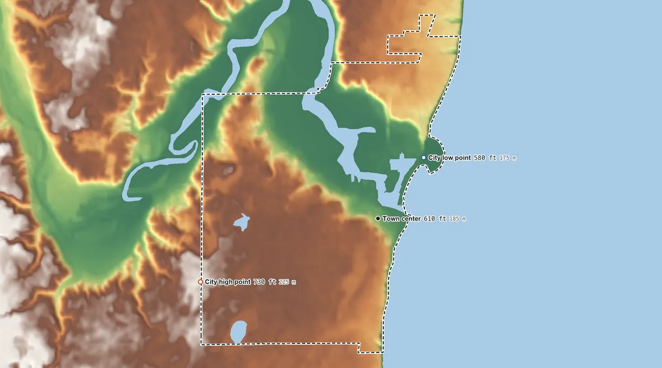 Topographic elevation map of Kewaunee, Wisconsin, shaded from 580 ft on the northeast side to 730 ft on the west side