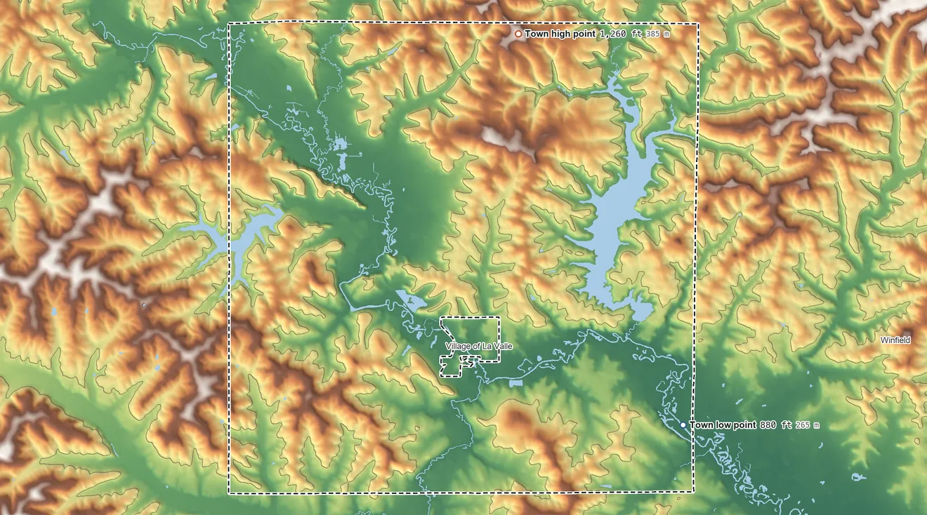 Topographic elevation map of La Valle, Wisconsin, shaded from 880 ft on the southeast side to 1,260 ft on the north side