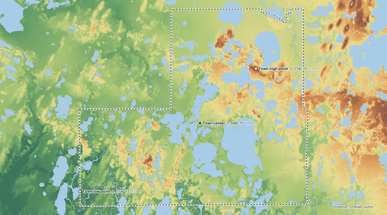 Topographic elevation map of Lac du Flambeau, Wisconsin, shaded from 1,550 ft on the southwest side to 1,750 ft on the northeast side