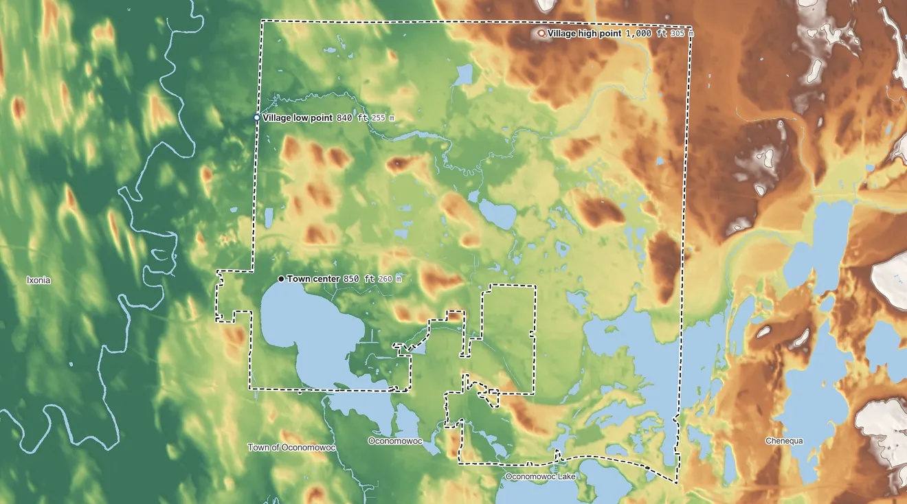 Topographic elevation map of Lac La Belle, Wisconsin, shaded from 840 ft on the north side to 1,000 ft on the northeast side