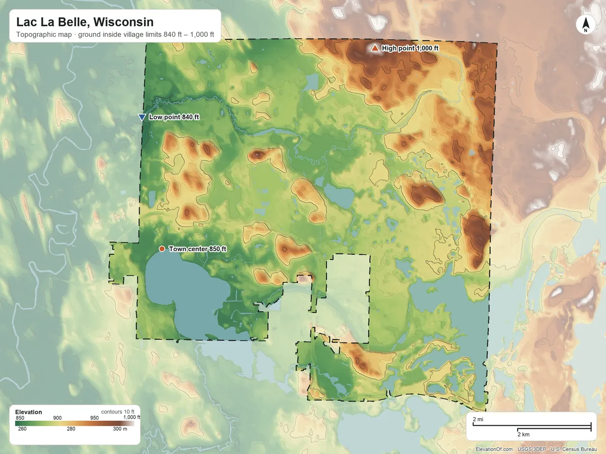 Topographic elevation map of Lac La Belle, Wisconsin, shaded from 840 ft on the north side to 1,000 ft on the northeast side