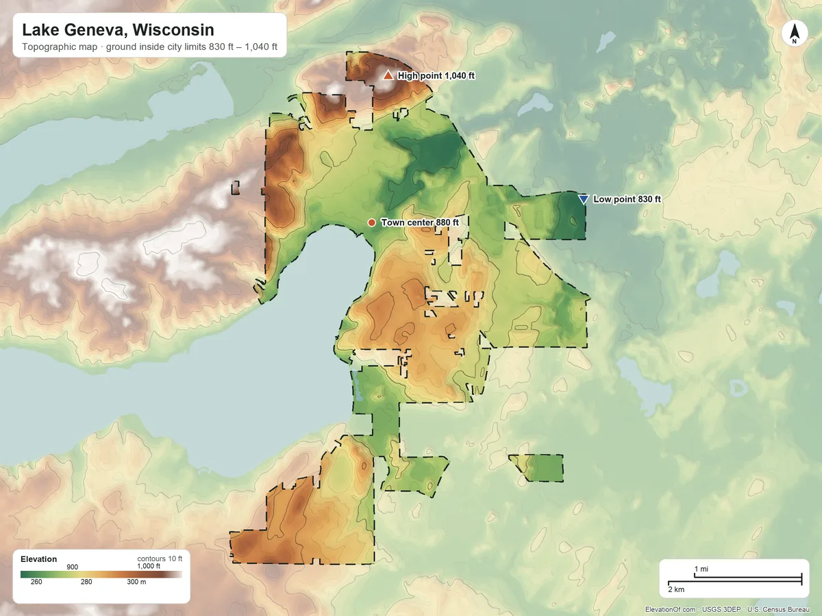 Topographic elevation map of Lake Geneva, Wisconsin, shaded from 830 ft on the east side to 1,040 ft on the north side