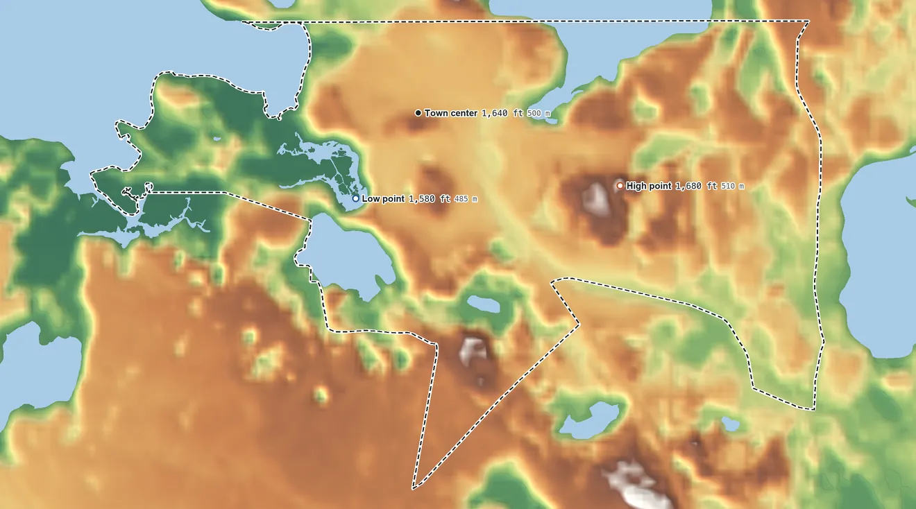 Topographic elevation map of Lake Tomahawk, Oneida County, Wisconsin, shaded from 1,580 ft on the southwest side to 1,680 ft on the east side