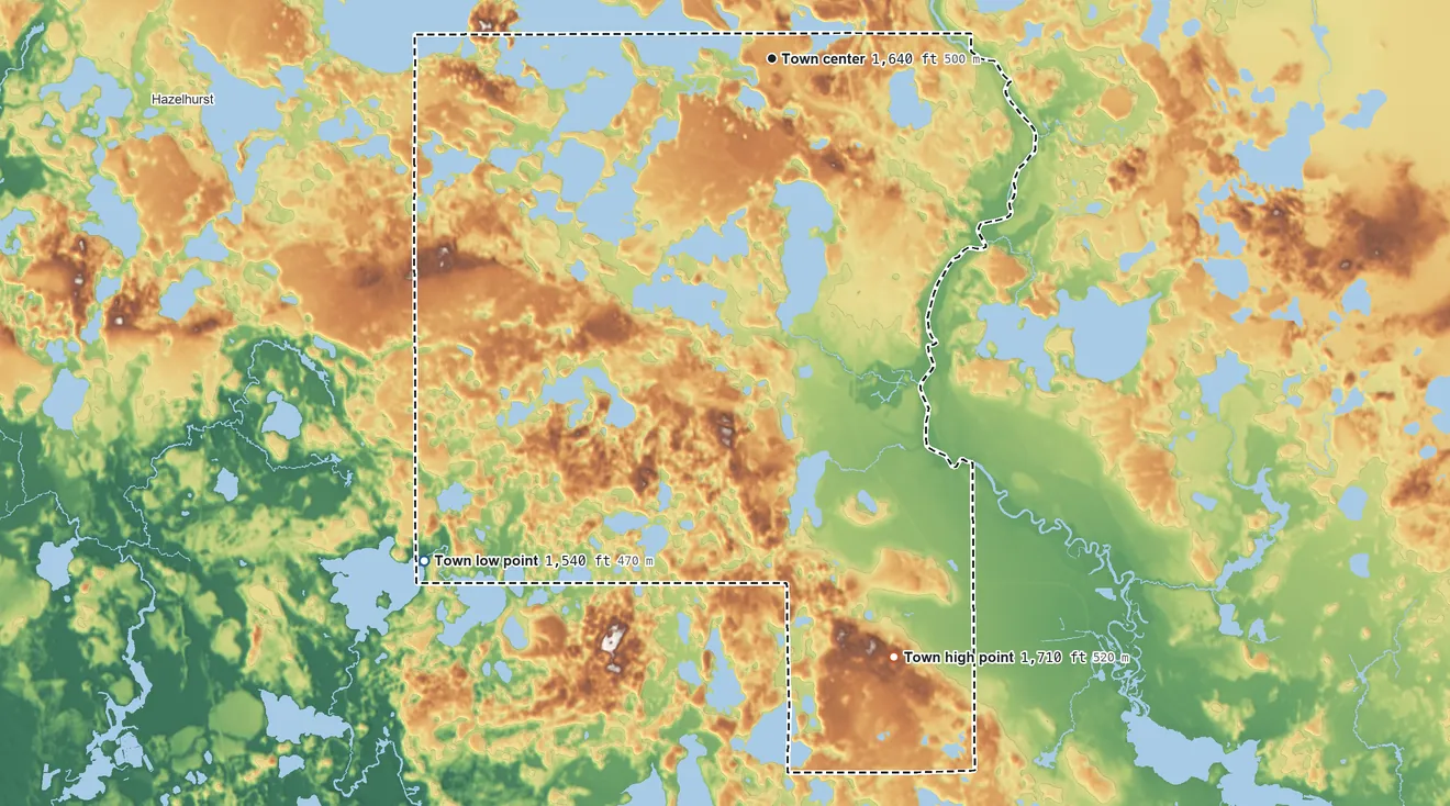 Topographic elevation map of Lake Tomahawk, Wisconsin, shaded from 1,540 ft on the southwest side to 1,710 ft on the south side