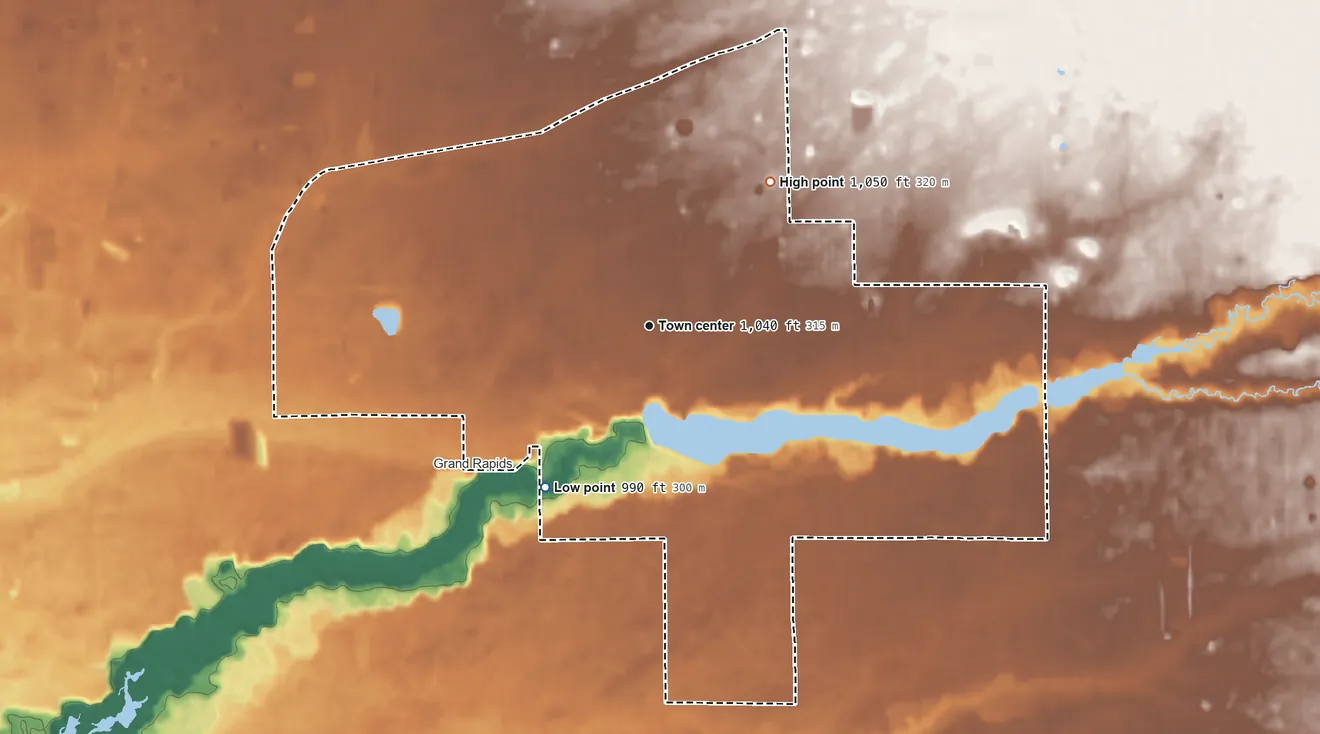 Topographic elevation map of Lake Wazeecha, Wisconsin, shaded from 990 ft on the southwest side to 1,050 ft on the northeast side