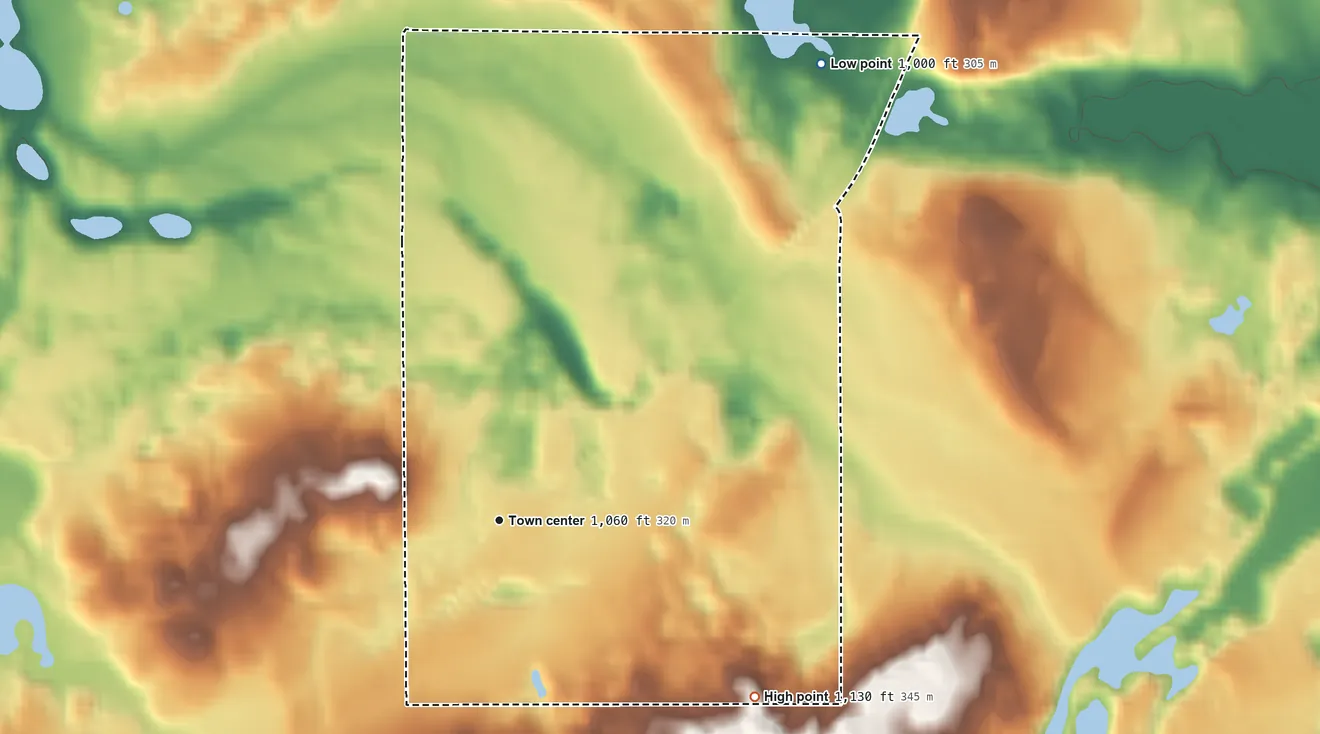 Topographic elevation map of Lewis, Wisconsin, shaded from 1,000 ft on the northeast side to 1,130 ft on the southeast side