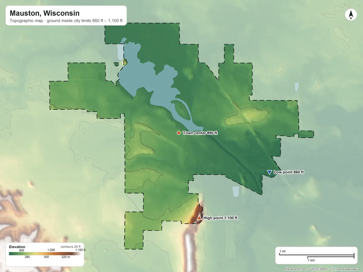 Topographic elevation map of Mauston, Wisconsin, shaded from 860 ft on the southeast side to 1,100 ft on the south side