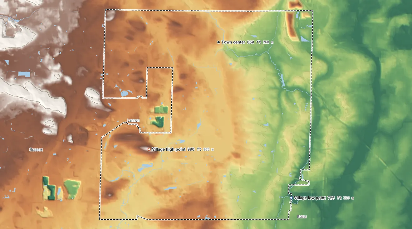 Topographic elevation map of Menomonee Falls, Wisconsin, shaded from 720 ft on the southeast side to 990 ft on the southwest side